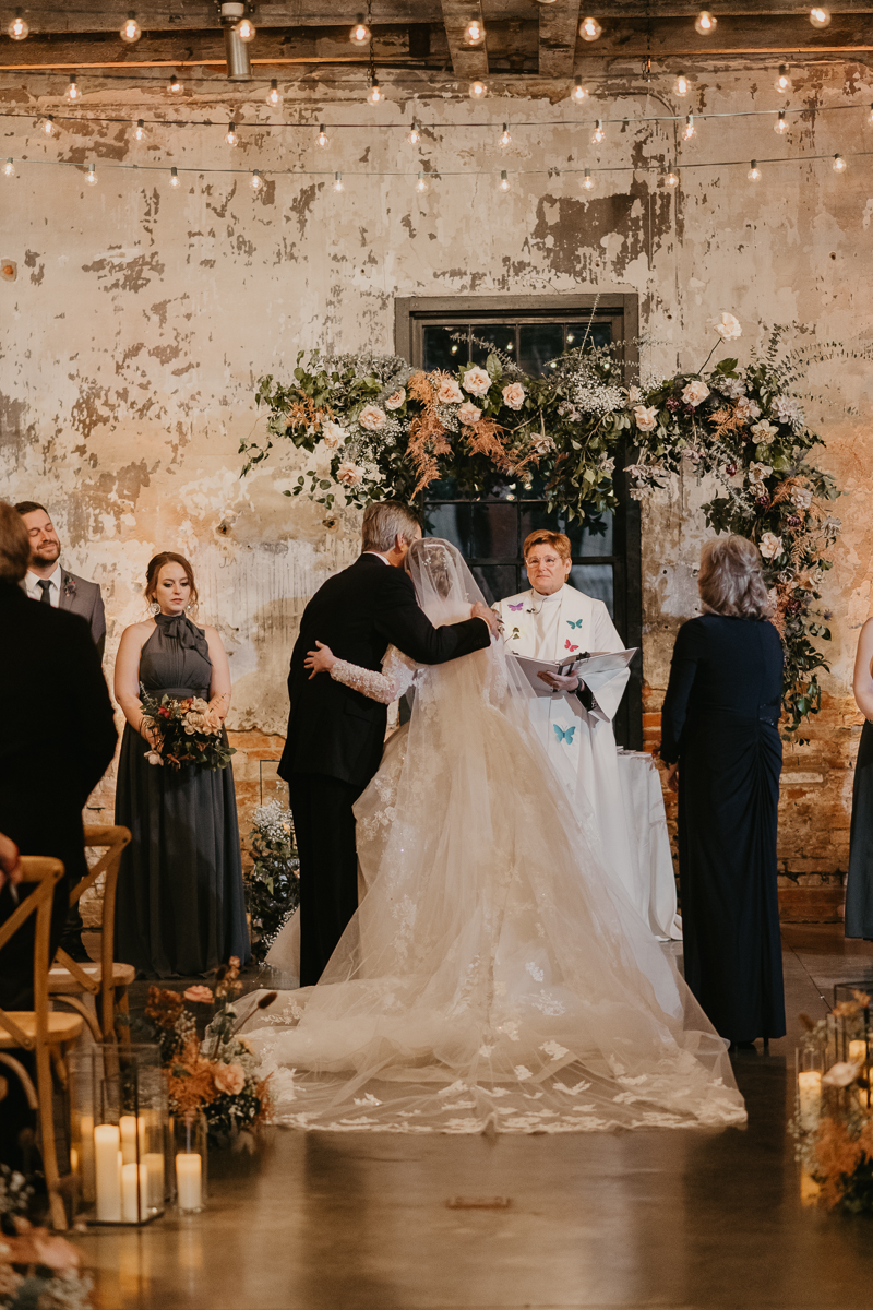 Amazing industrial wedding ceremony at the Mt. Washington Mill Dye House in Baltimore, Maryland by Britney Clause Photography