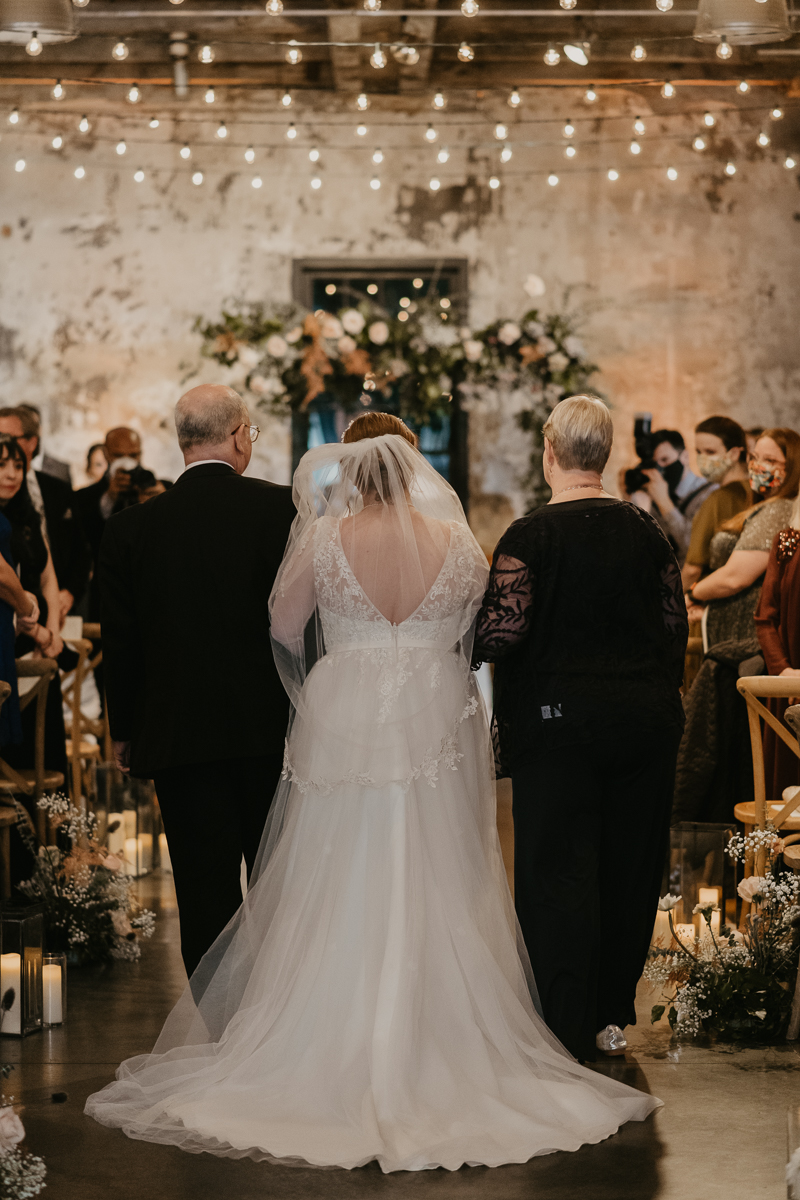 Amazing industrial wedding ceremony at the Mt. Washington Mill Dye House in Baltimore, Maryland by Britney Clause Photography