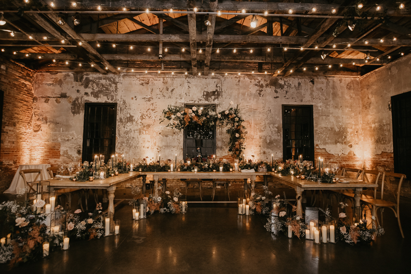 Magical wedding reception decor by Steel Cut Flower Co., Linwoods Catering, and Celebrations LLC at the Mt. Washington Mill Dye House in Baltimore, Maryland by Britney Clause Photography