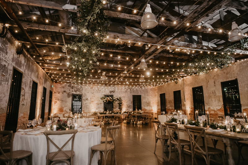 Magical wedding reception decor by Steel Cut Flower Co., Linwoods Catering, and Celebrations LLC at the Mt. Washington Mill Dye House in Baltimore, Maryland by Britney Clause Photography