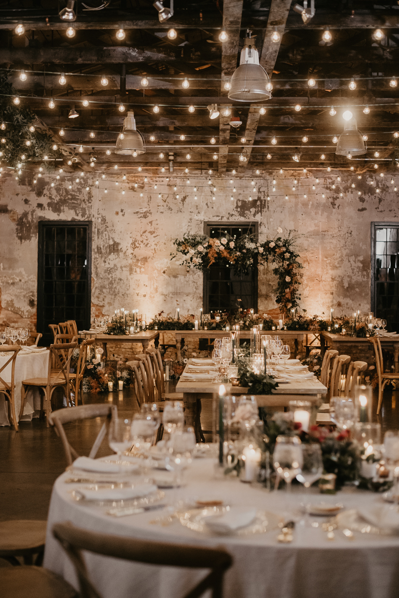 Magical wedding reception decor by Steel Cut Flower Co., Linwoods Catering, and Celebrations LLC at the Mt. Washington Mill Dye House in Baltimore, Maryland by Britney Clause Photography