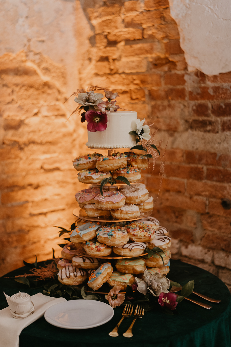 Delicious donut wedding cake by Linwoods Catering at the Mt. Washington Mill Dye House in Baltimore, Maryland by Britney Clause Photography