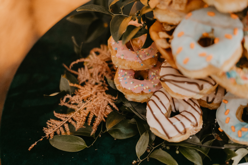 Delicious donut wedding cake by Linwoods Catering at the Mt. Washington Mill Dye House in Baltimore, Maryland by Britney Clause Photography