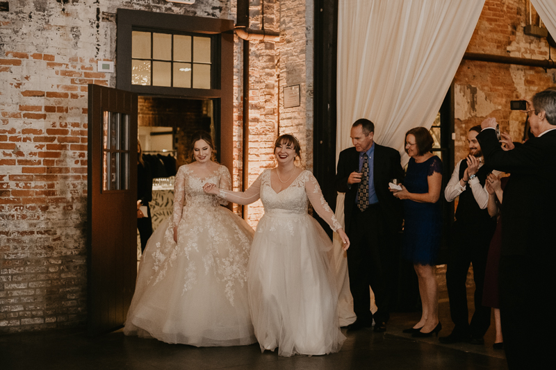 A bright and light filled evening wedding reception by District Remix DJs at the Mt. Washington Mill Dye House in Baltimore, Maryland by Britney Clause Photography