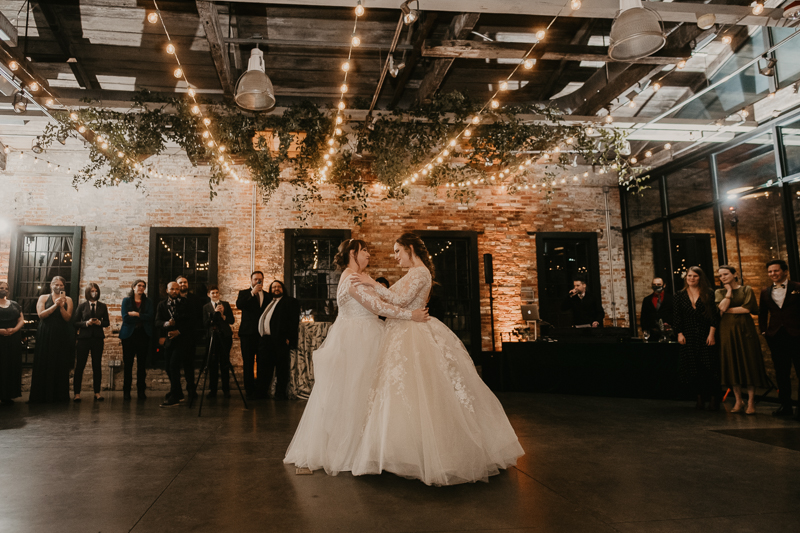 A bright and light filled evening wedding reception by District Remix DJs at the Mt. Washington Mill Dye House in Baltimore, Maryland by Britney Clause Photography