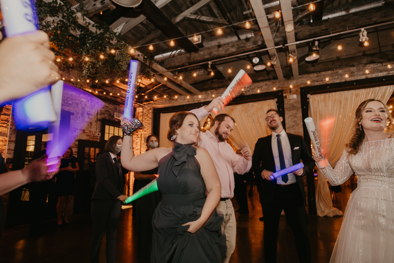 A bright and light filled evening wedding reception by District Remix DJs at the Mt. Washington Mill Dye House in Baltimore, Maryland by Britney Clause Photography