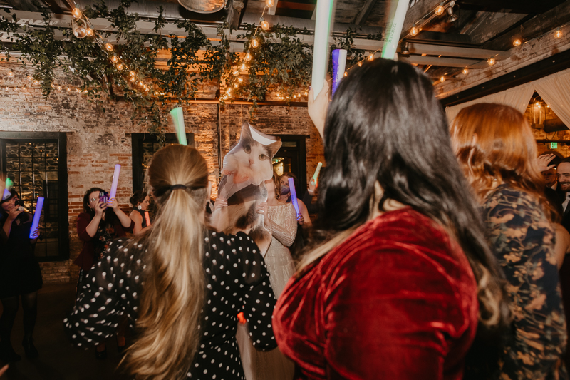 A bright and light filled evening wedding reception by District Remix DJs at the Mt. Washington Mill Dye House in Baltimore, Maryland by Britney Clause Photography