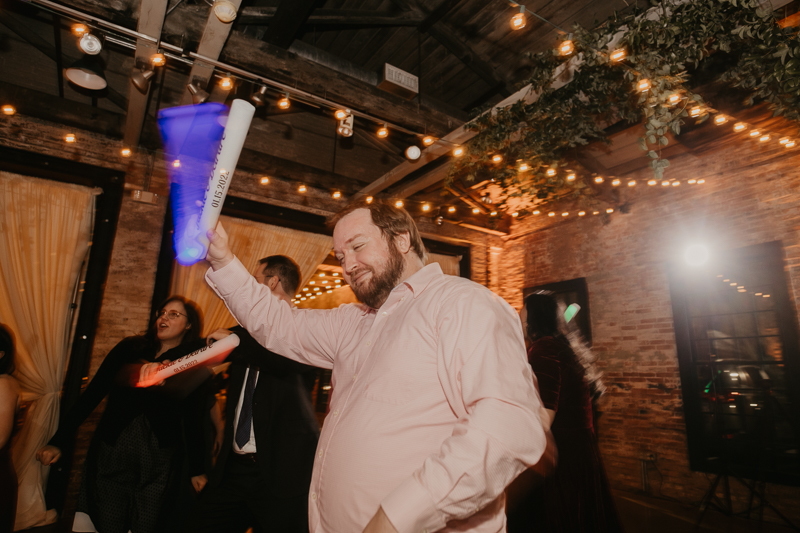 A bright and light filled evening wedding reception by District Remix DJs at the Mt. Washington Mill Dye House in Baltimore, Maryland by Britney Clause Photography