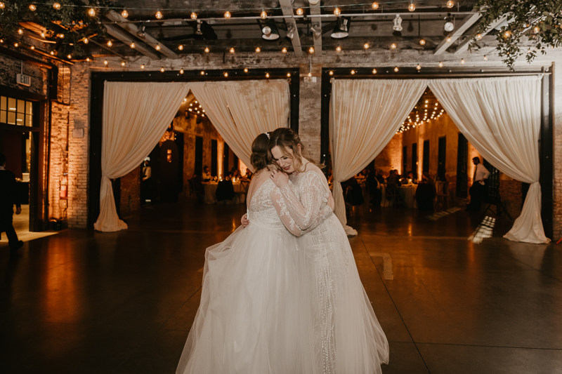 A bright and light filled evening wedding reception by District Remix DJs at the Mt. Washington Mill Dye House in Baltimore, Maryland by Britney Clause Photography