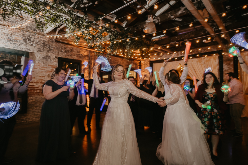 A bright and light filled evening wedding reception by District Remix DJs at the Mt. Washington Mill Dye House in Baltimore, Maryland by Britney Clause Photography