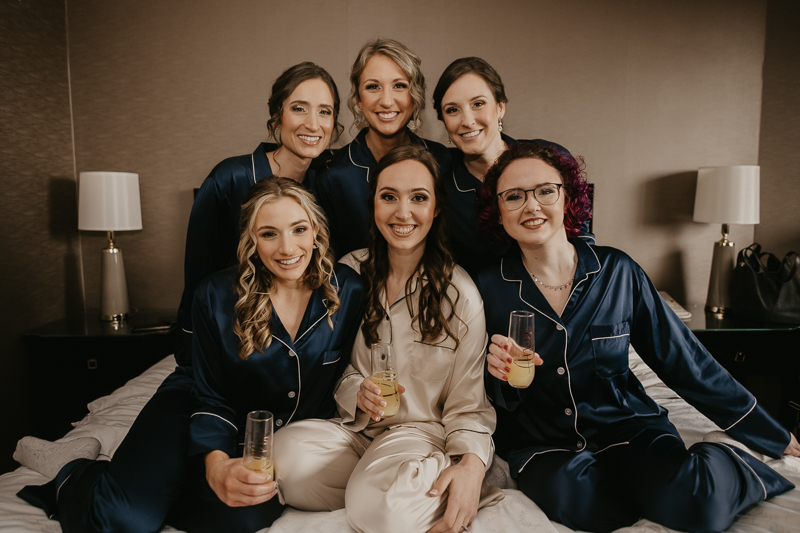 A bride getting ready at the Sheraton Baltimore North Hotel for a Mt. Washington Mill Dye House in Baltimore, Maryland by Britney Clause Photography