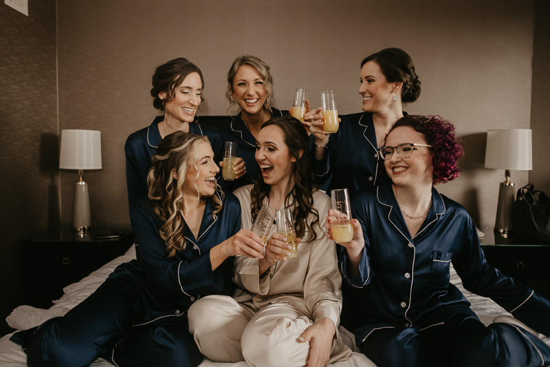 A bride getting ready at the Sheraton Baltimore North Hotel for a Mt. Washington Mill Dye House in Baltimore, Maryland by Britney Clause Photography