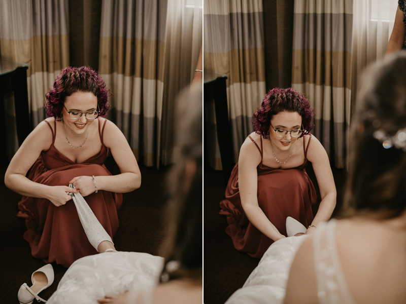 A bride getting ready at the Sheraton Baltimore North Hotel for a Mt. Washington Mill Dye House in Baltimore, Maryland by Britney Clause Photography