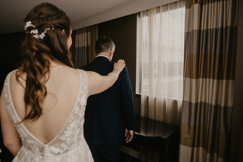 A bride getting ready at the Sheraton Baltimore North Hotel for a Mt. Washington Mill Dye House in Baltimore, Maryland by Britney Clause Photography