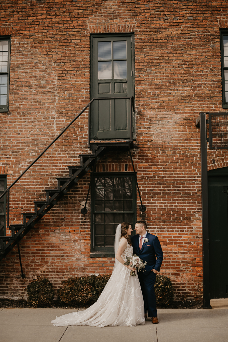 Stunning bride and groom wedding portraits at the Mt. Washington Mill Dye House in Baltimore, Maryland by Britney Clause Photography