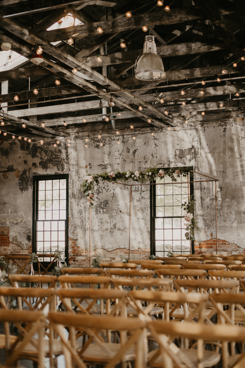 Amazing wedding ceremony florals by Scensational Florals at the Mt. Washington Mill Dye House in Baltimore, Maryland by Britney Clause Photography