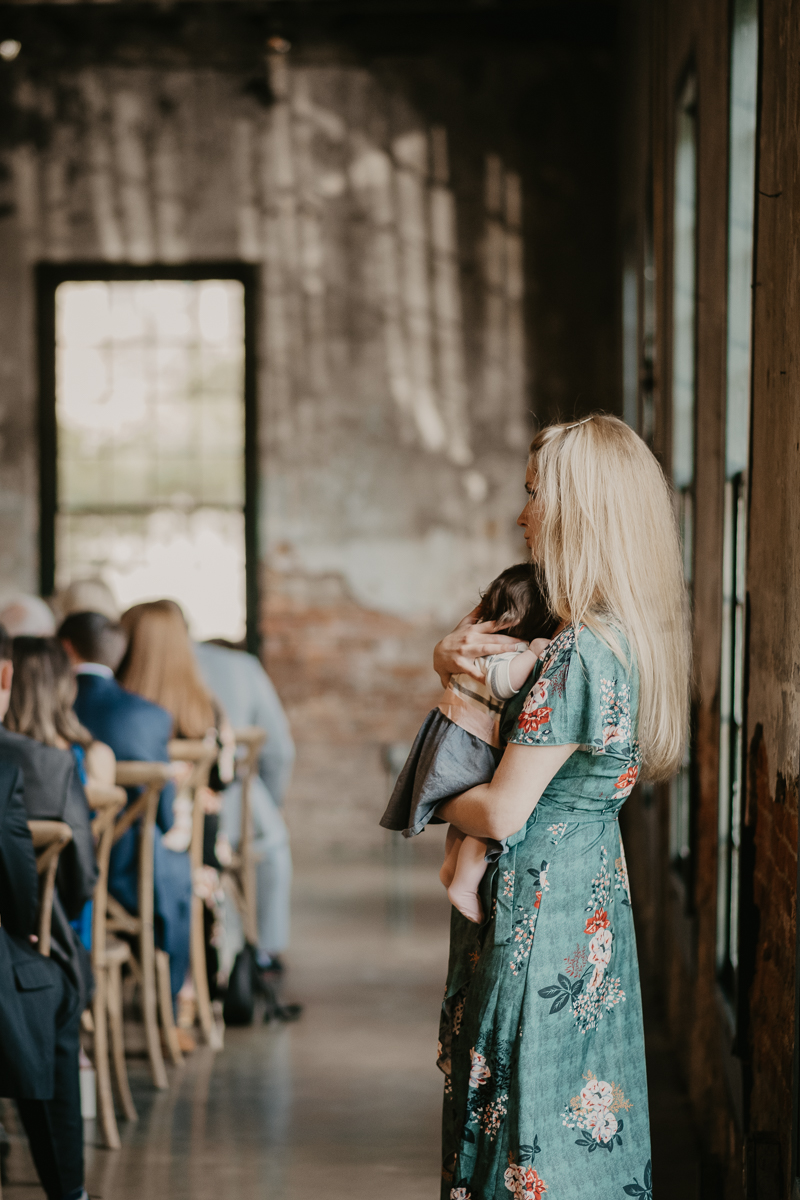 Amazing industrial wedding ceremony at the Mt. Washington Mill Dye House in Baltimore, Maryland by Britney Clause Photography