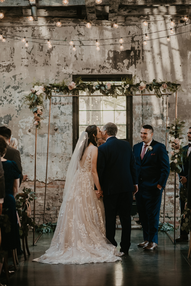 Amazing industrial wedding ceremony at the Mt. Washington Mill Dye House in Baltimore, Maryland by Britney Clause Photography