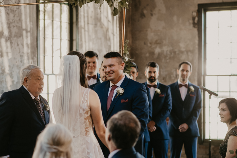 Amazing industrial wedding ceremony at the Mt. Washington Mill Dye House in Baltimore, Maryland by Britney Clause Photography