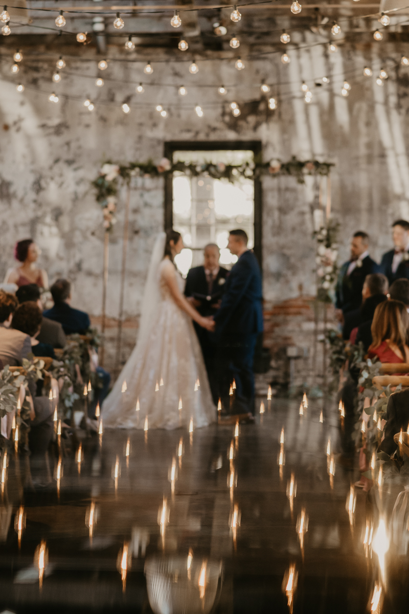 Amazing industrial wedding ceremony at the Mt. Washington Mill Dye House in Baltimore, Maryland by Britney Clause Photography