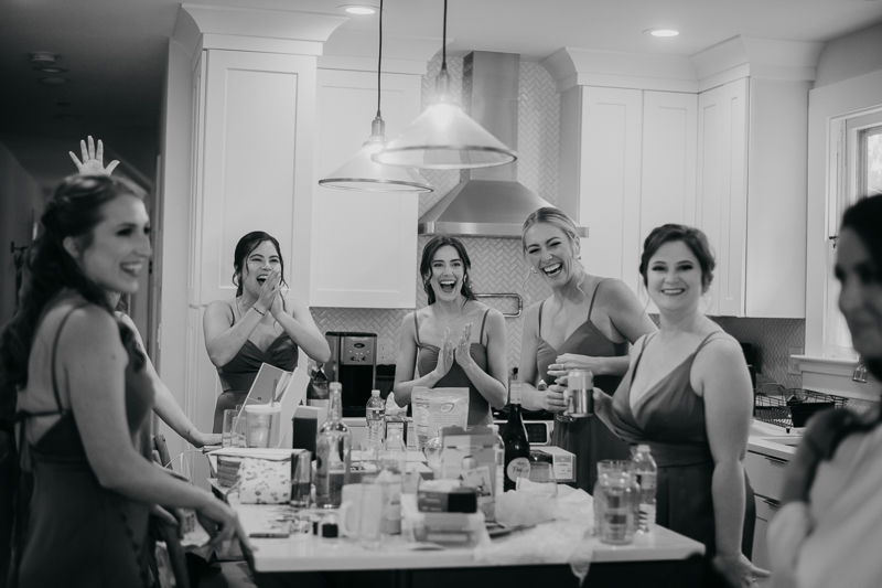 A bride getting ready at a private residence for an Annapolis Waterfront Hotel Wedding in Annapolis, Maryland by Britney Clause Photography