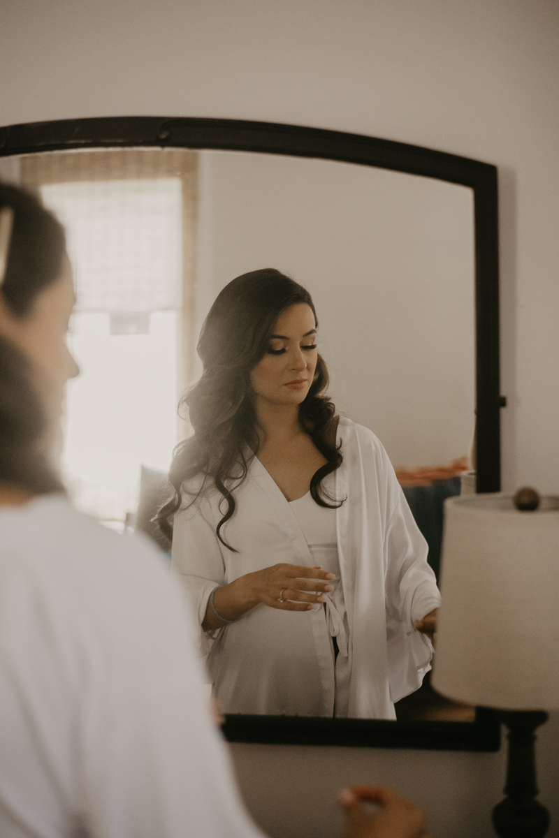 A bride getting ready at a private residence for an Annapolis Waterfront Hotel Wedding in Annapolis, Maryland by Britney Clause Photography