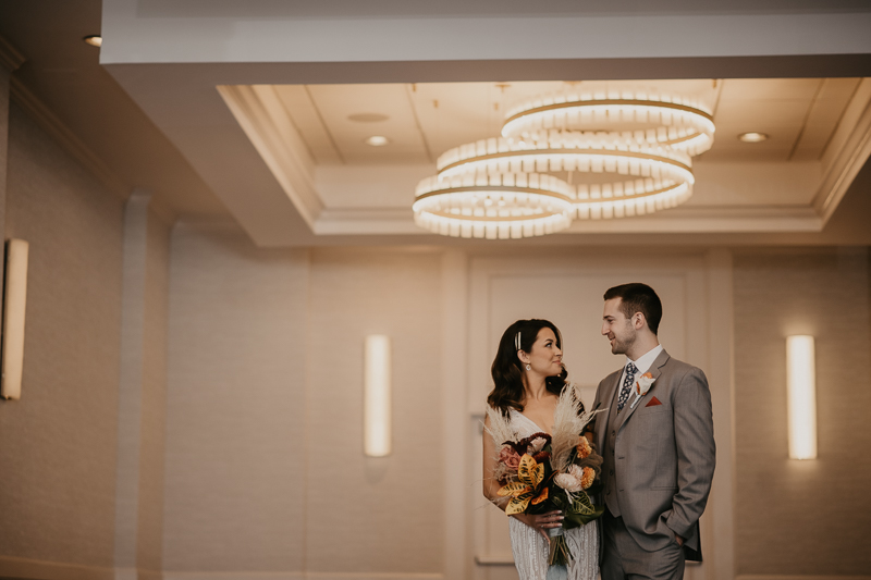 Stunning bride and groom wedding portraits at the Annapolis Waterfront Hotel in Annapolis, Maryland by Britney Clause Photography