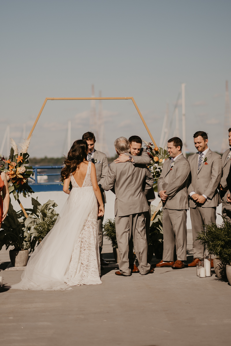 Amazing waterfront wedding ceremony at the Annapolis Waterfront Hotel in Annapolis, Maryland by Britney Clause Photography