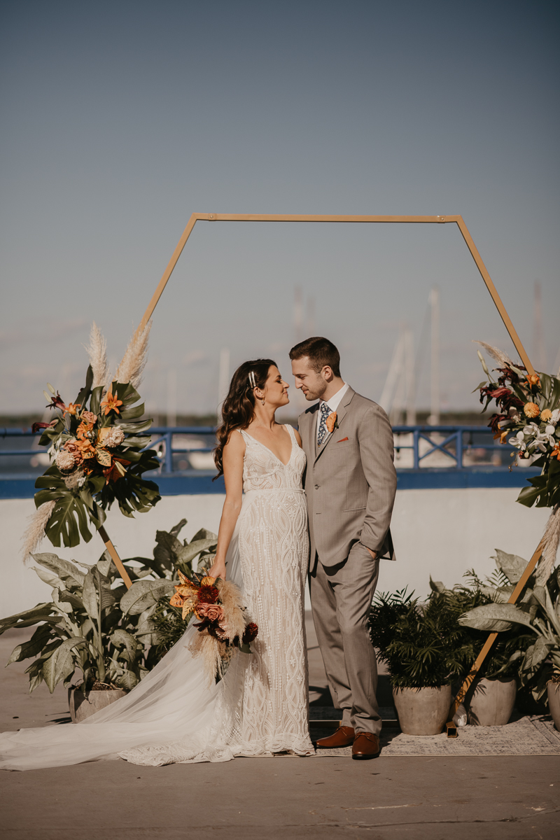 Stunning bride and groom wedding portraits at the Annapolis Waterfront Hotel in Annapolis, Maryland by Britney Clause Photography