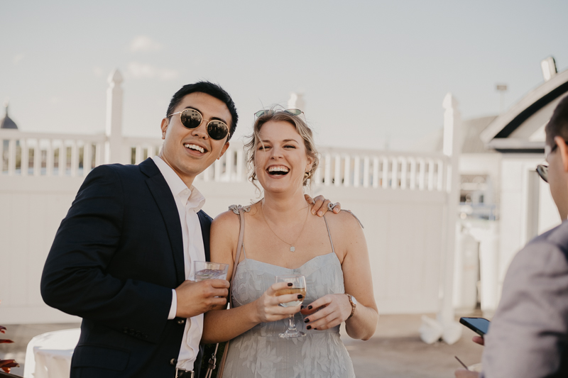 A stunning waterfront wedding reception at the Annapolis Waterfront Hotel in Annapolis, Maryland by Britney Clause Photography