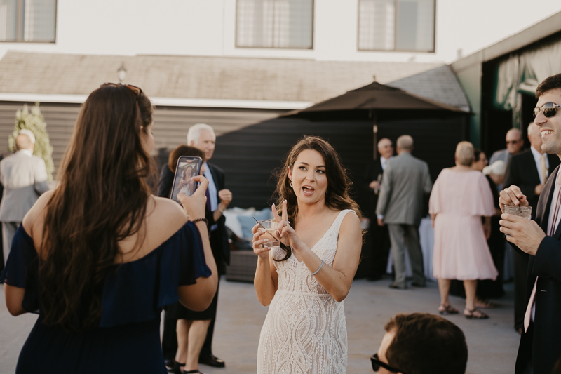 A stunning waterfront wedding reception at the Annapolis Waterfront Hotel in Annapolis, Maryland by Britney Clause Photography