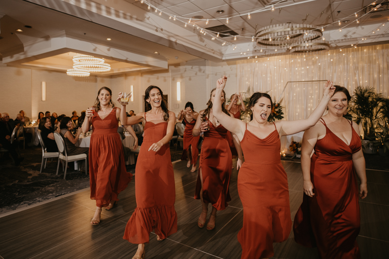 An exciting evening wedding reception by Toussaint Productions at the Annapolis Waterfront Hotel in Annapolis, Maryland by Britney Clause Photography