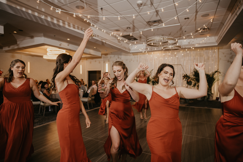 An exciting evening wedding reception by Toussaint Productions at the Annapolis Waterfront Hotel in Annapolis, Maryland by Britney Clause Photography