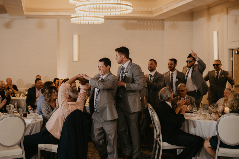 An exciting evening wedding reception by Toussaint Productions at the Annapolis Waterfront Hotel in Annapolis, Maryland by Britney Clause Photography