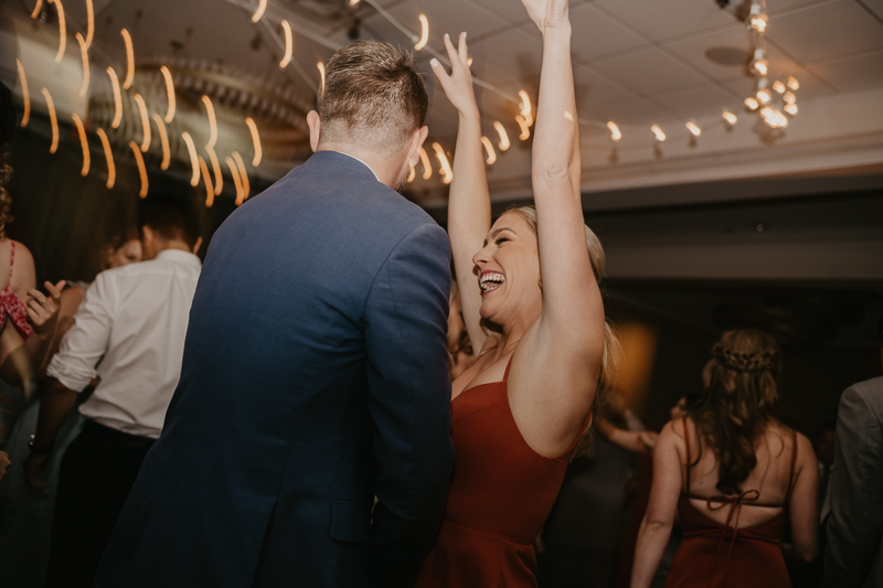 An exciting evening wedding reception by Toussaint Productions at the Annapolis Waterfront Hotel in Annapolis, Maryland by Britney Clause Photography