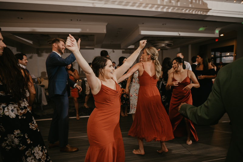 An exciting evening wedding reception by Toussaint Productions at the Annapolis Waterfront Hotel in Annapolis, Maryland by Britney Clause Photography