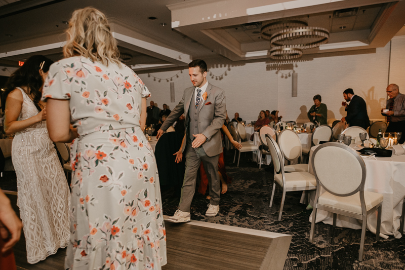 An exciting evening wedding reception by Toussaint Productions at the Annapolis Waterfront Hotel in Annapolis, Maryland by Britney Clause Photography