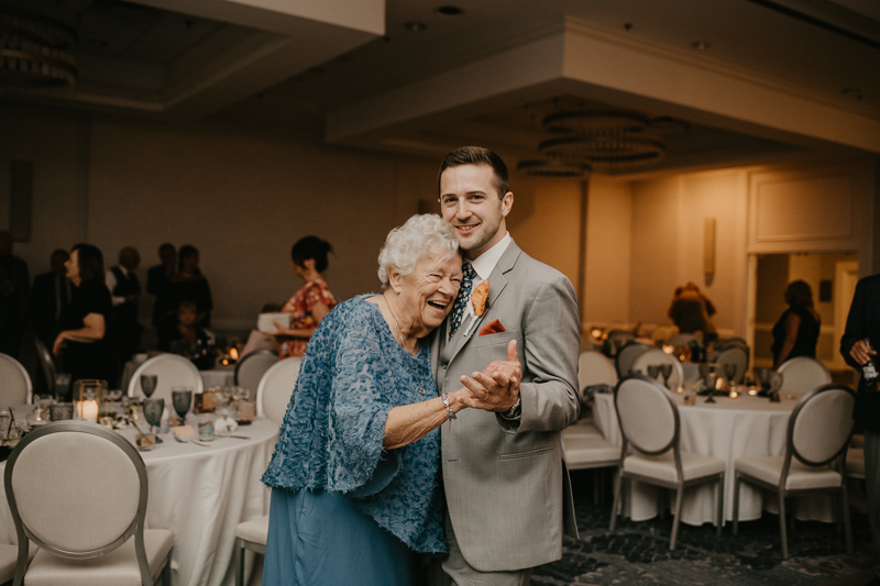 An exciting evening wedding reception by Toussaint Productions at the Annapolis Waterfront Hotel in Annapolis, Maryland by Britney Clause Photography