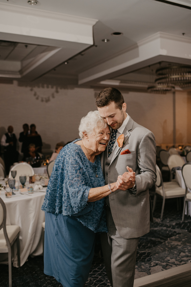 An exciting evening wedding reception by Toussaint Productions at the Annapolis Waterfront Hotel in Annapolis, Maryland by Britney Clause Photography