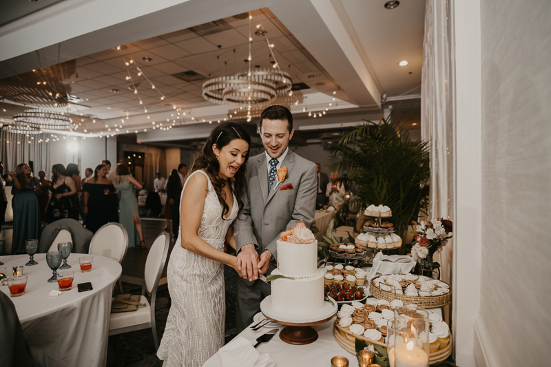 An exciting evening wedding reception by Toussaint Productions at the Annapolis Waterfront Hotel in Annapolis, Maryland by Britney Clause Photography