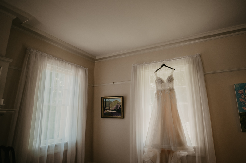 A stunning Maggie Sottero wedding dress from Lilla's Bridal Boutique at the Liriodendron Mansion in Bel Air, Maryland by Britney Clause Photography