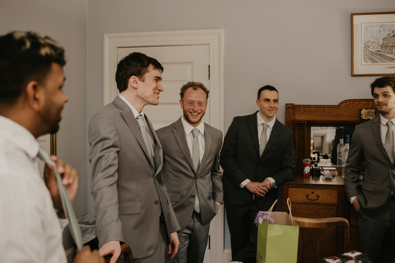 A groom getting ready at the Liriodendron Mansion in Bel Air, Maryland by Britney Clause Photography