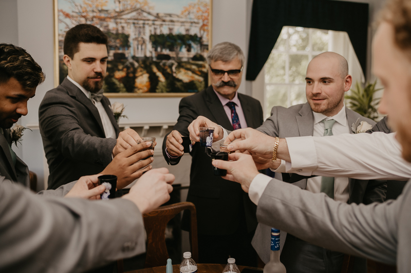 A groom getting ready at the Liriodendron Mansion in Bel Air, Maryland by Britney Clause Photography