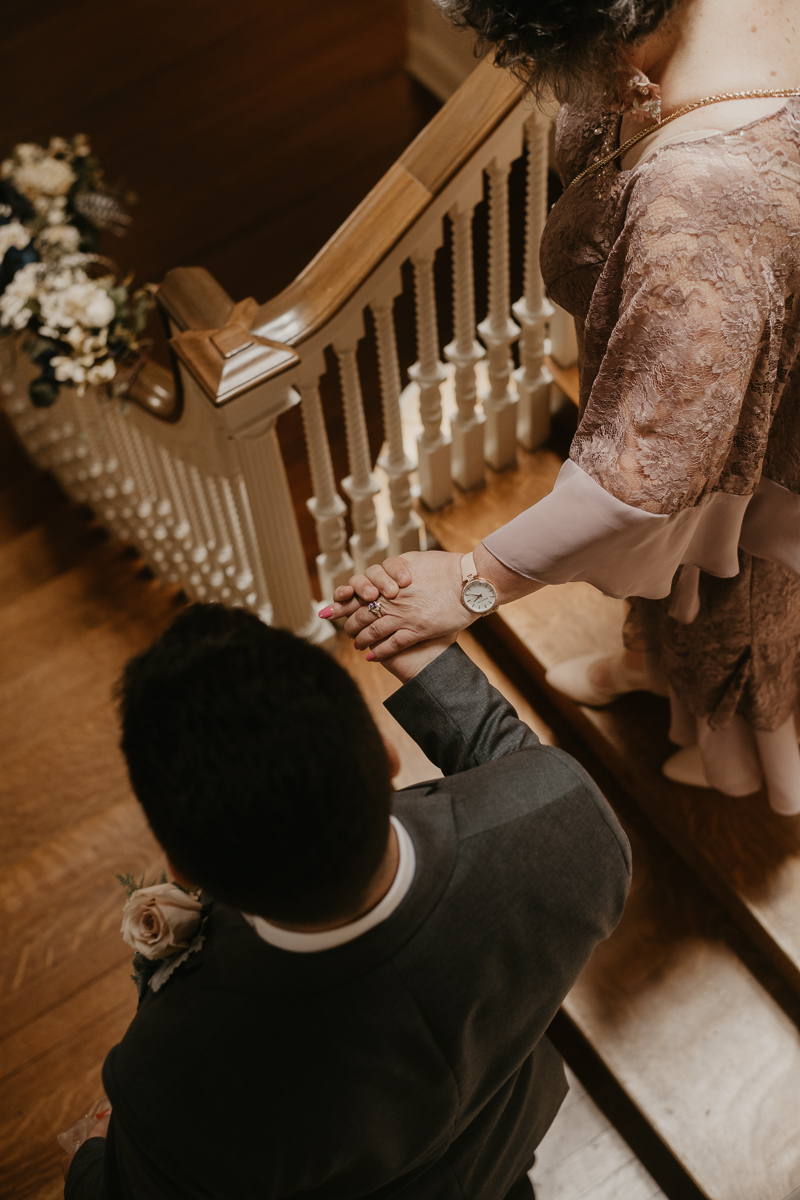 A sentimental bride and groom First Touch at the Liriodendron Mansion in Bel Air, Maryland by Britney Clause Photography