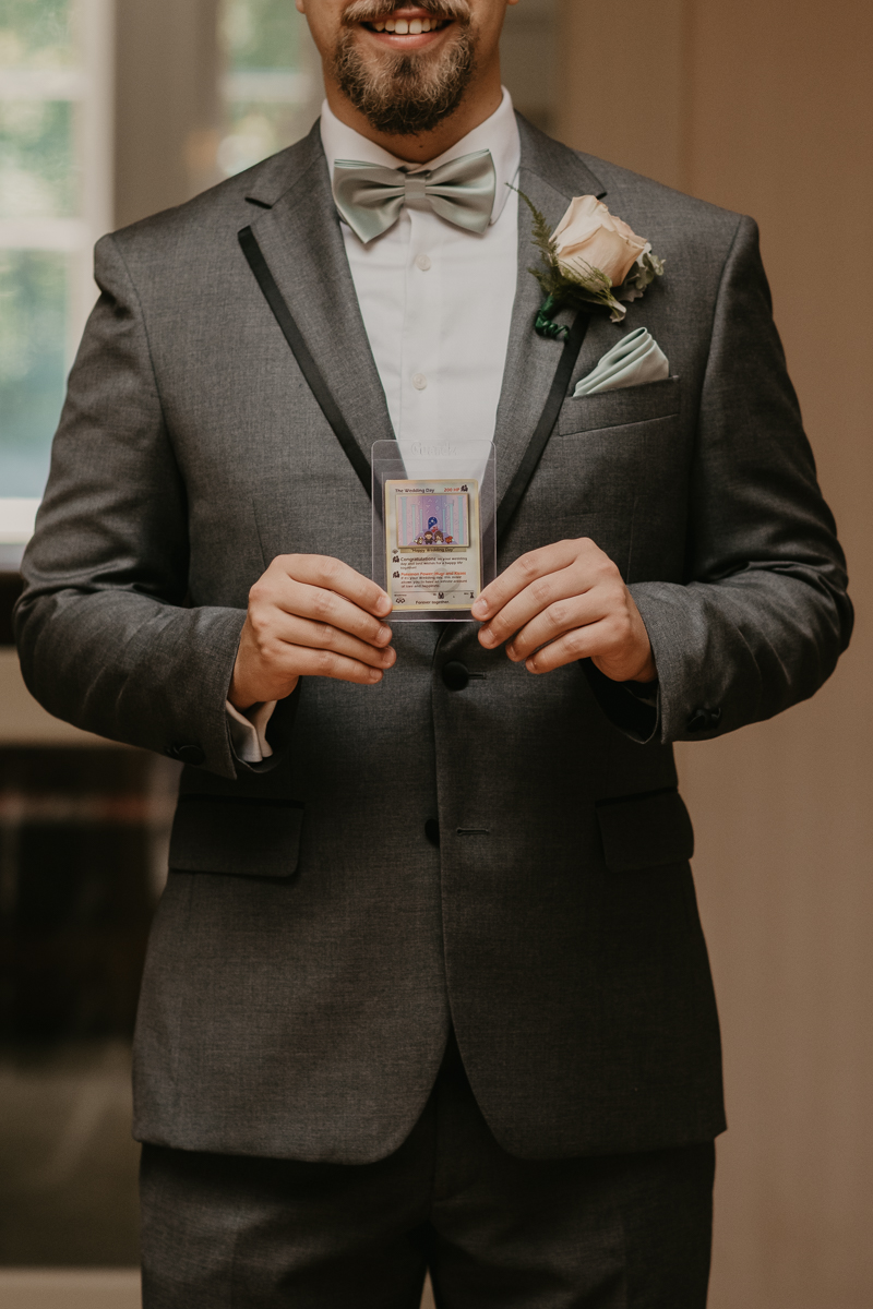 A sentimental bride and groom First Touch at the Liriodendron Mansion in Bel Air, Maryland by Britney Clause Photography