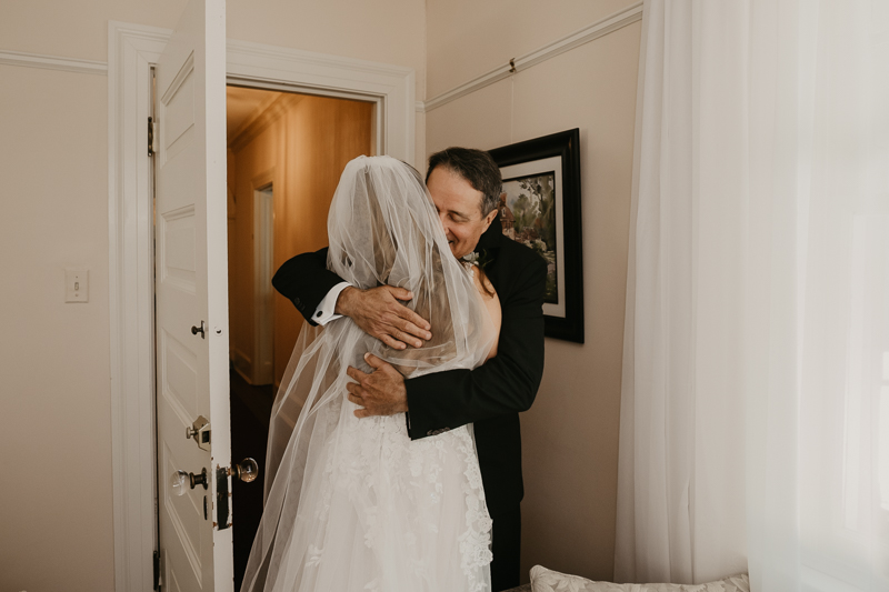 A bride getting ready at the Liriodendron Mansion in Bel Air, Maryland by Britney Clause Photography