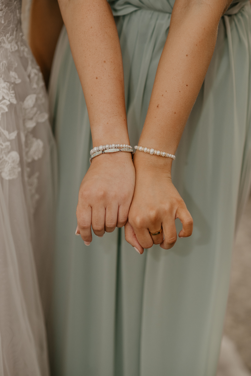 A bride getting ready at the Liriodendron Mansion in Bel Air, Maryland by Britney Clause Photography