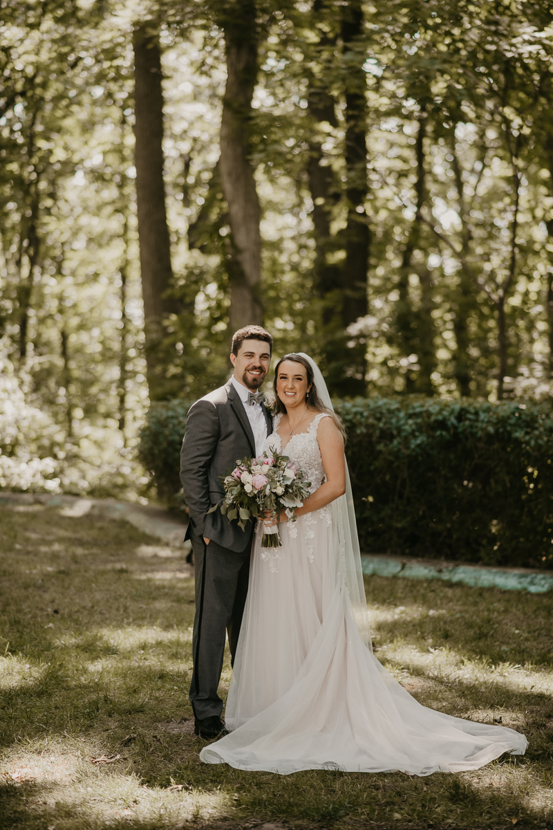 Stunning bride and groom wedding portraits at the Liriodendron Mansion in Bel Air, Maryland by Britney Clause Photography