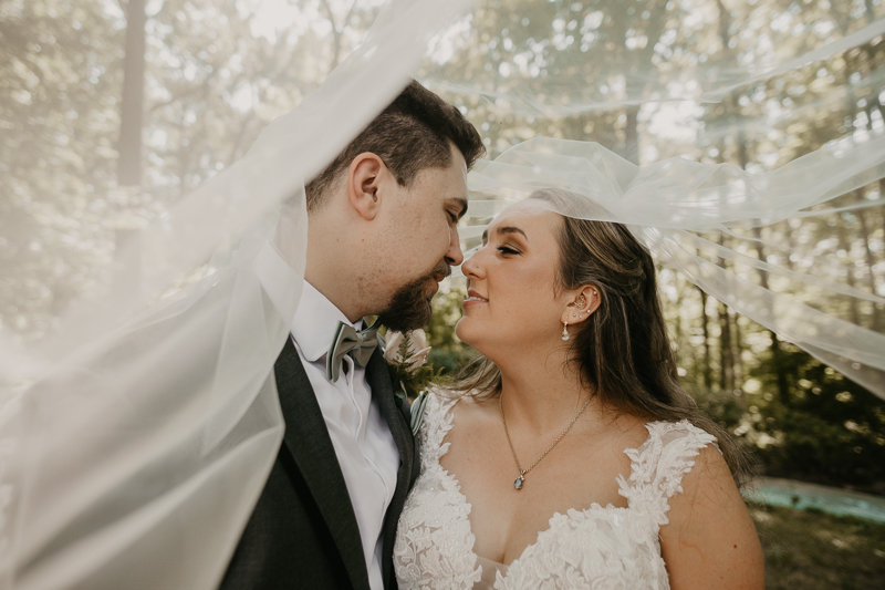 Stunning bride and groom wedding portraits at the Liriodendron Mansion in Bel Air, Maryland by Britney Clause Photography