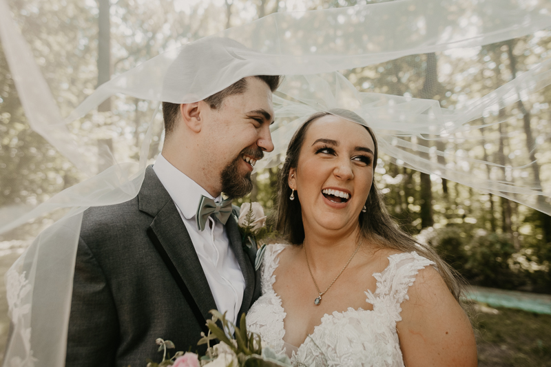 Stunning bride and groom wedding portraits at the Liriodendron Mansion in Bel Air, Maryland by Britney Clause Photography